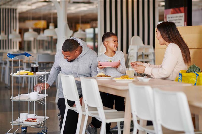 A family sitting in the IKEA restaurant having lunch