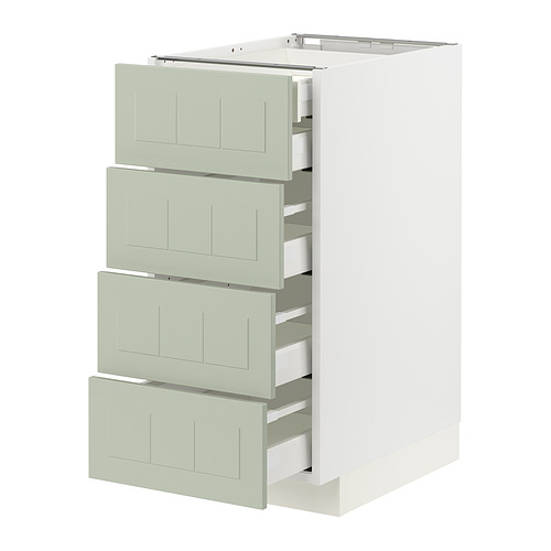 Un mueble de cocina METOD blanco con cuatro cajones verdes, que ofrece un amplio espacio de almacenamiento en un diseño moderno y minimalista.
