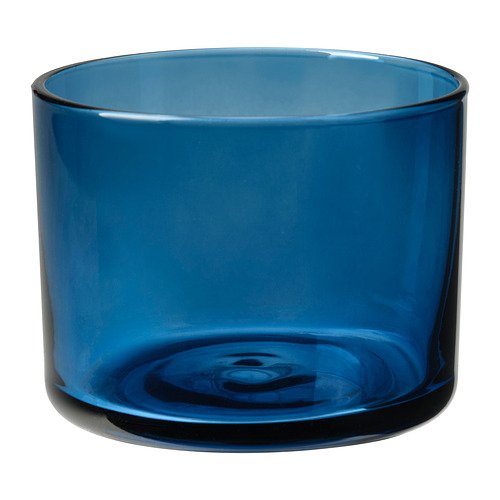 Candelabro de vidrio azul, forma cilíndrica, acabado liso, sin patrones.