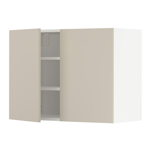 Un mueble de cocina METOD beige con dos puertas y un estante ajustable. El armario es rectangular de líneas suaves y limpias.