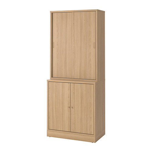Mueble TONSTAD de roble claro con puertas correderas y dobles, diseño clásico y elegante.