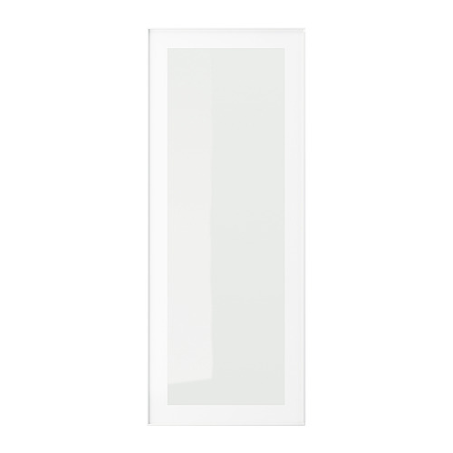 Una puerta de armario de cristal HEJSTA blanca con un diseño moderno y minimalista con tirador integrado y bordes enmarcados.