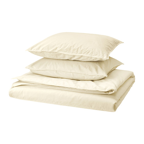 Juego de cama crema ÄNGSLILJA: edredón blanco doblado y dos almohadas, algodón natural.