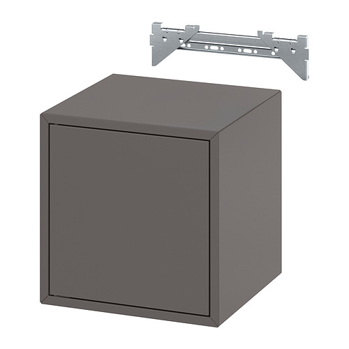 Un mueble de almacenamiento EKET en forma de cubo en gris oscuro con un diseño minimalista, independiente.