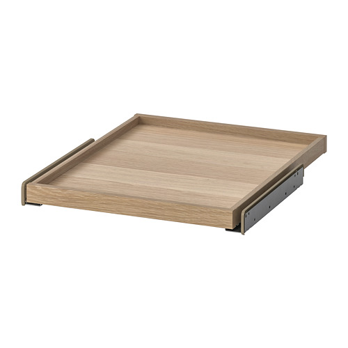 Una bandeja extraíble KOMPLEMENT de ikea. Es de color marrón claro, rectangular, con textura de madera y corredores metálicos. Ideal para guardar en el armario.
