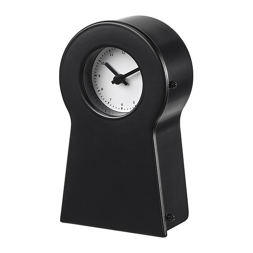 Reloj negro IKEA PS 1995 , diseño moderno con esfera redonda, cuerpo de acero, frente de cristal.
