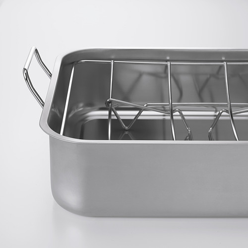 Bandeja para asar acero inoxidable con rejilla en forma de U, dos asas resistentes, diseñada para uso en horno o parrilla.