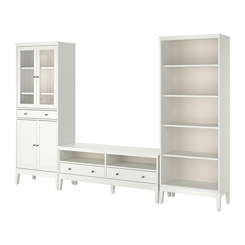 Conjunto de muebles IDANÄS blancos de tres piezas: armario con puerta de cristal, cajonera y librería abierta, diseño limpio y moderno.