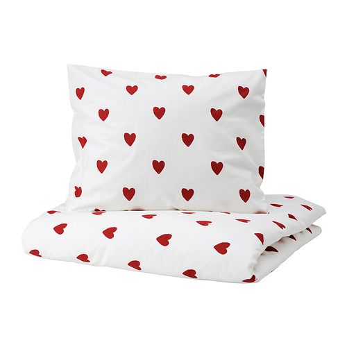 Juego de edredón y almohada blanco con estampado de corazones. Corazones rojos, algodón suave, cierre de cremallera.