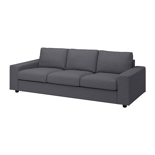 Moderno sofá de 3 plazas en gris oscuro, diseño limpio, tejido suave, cojines cuadrados.