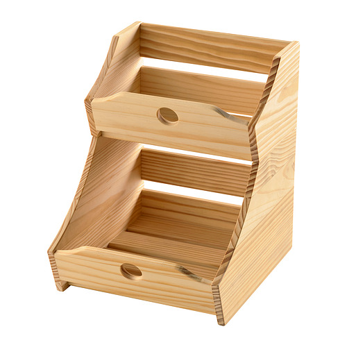 Caja de almacenamiento escalonada de madera de color claro con dos cajones.