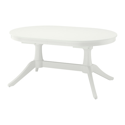 Mesa de comedor ovalada extensible blanca con patas robustas, que combina funcionalidad y elegancia.