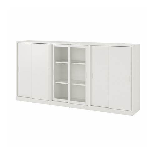 Un mueble de almacenaje TONSTAD blanco con puertas correderas de cristal, con un diseño elegante y estantes ajustables para un almacenamiento versátil.