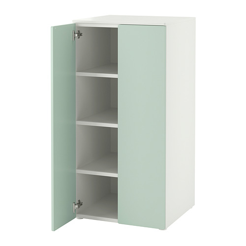 Pequeño armario infantil blanco y verde claro con 3 estantes, puertas de cierre suave.