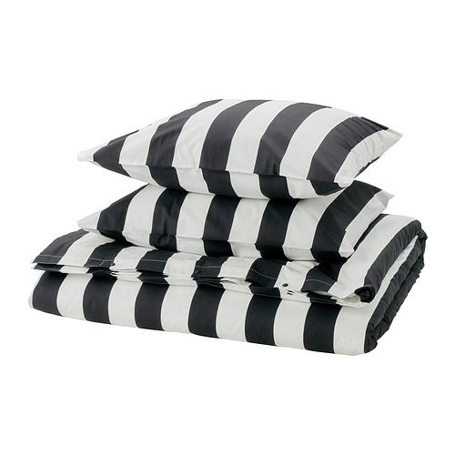 Juego de cama de rayas blancas y negras, con funda nórdica y fundas de almohada, con un diseño clásico y moderno.