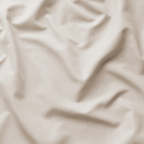 Difumina una tela beige, probablemente una funda de sofá extraíble de alta calidad con un tejido suave y un sutil efecto de tono.