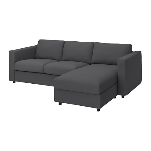 La imagen muestra un sofá modular VIMLE, gris oscuro, moderno, de líneas limpias, y una tumbona.