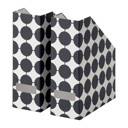 Revistero Tjbna, círculos blancos/negros, papel, rectangular, expositor inclinado.