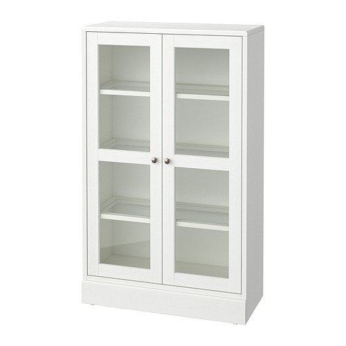 Gabinete de madera blanca HAVSTA con puertas de vidrio, elegante y moderno, exhibe artículos, cuatro estantes interiores.