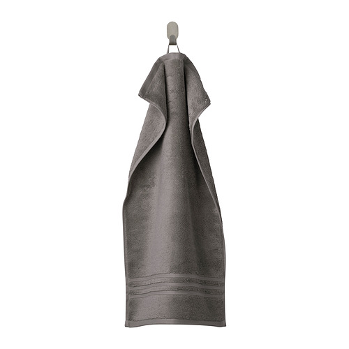 Toalla de algodón orgánico gris BROKGLIM en percha, rectangular con borde texturizado.