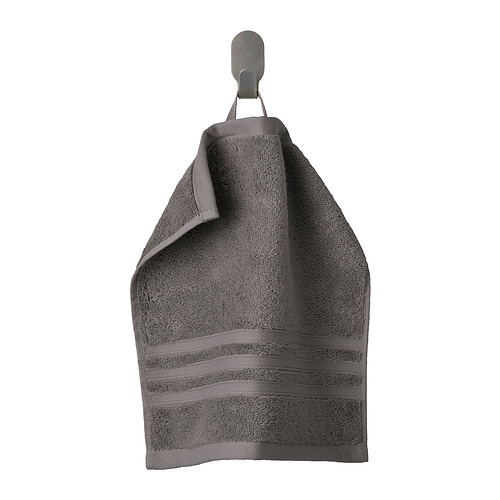 Toalla de algodón orgánico BROKGLIM gris en gancho con borde tejido.