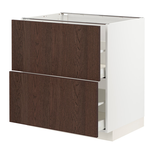 Mueble de cocina METOD de Ikea, madera de sinarp marrón oscuro, estructura blanca, dos cajones abiertos.