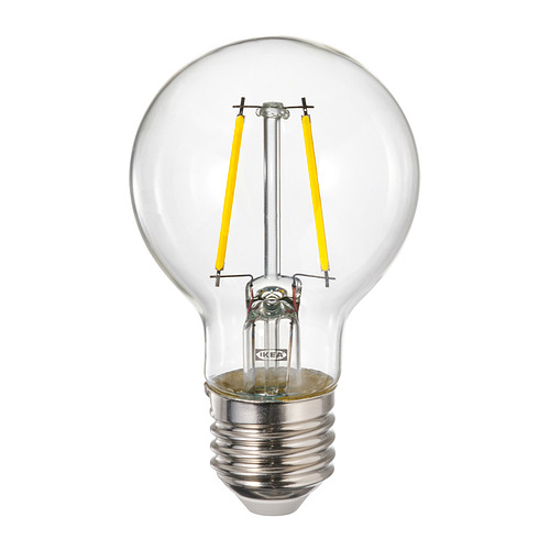 Bombilla LUNNOM de Ikea, cristal transparente, filamento amarillo, forma esférica.