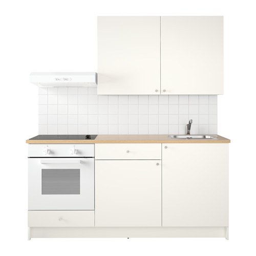 Pequeña configuración de cocina blanca con horno, fregadero y gabinetes incorporados. Diseño moderno con un aspecto limpio.