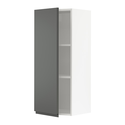 Moderno mueble de cocina gris oscuro con un estante ajustable.