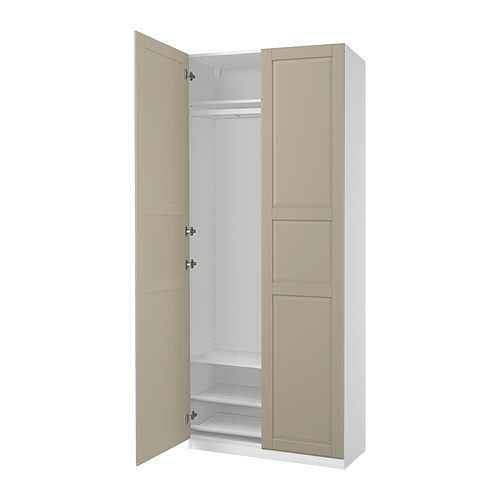 Armario PAX: alto, beige, minimalista, puertas beige, materiales de madera, marco estrecho, bisagras de cierre suave.