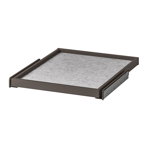 Una bandeja extraíble gris KOMPLEMENT con una alfombrilla de fieltro para organizar los artículos.