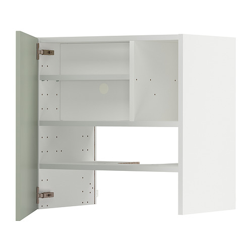 Exhibe un mueble de cocina METOD blanco con frentes verdes, con estantes y almacenamiento ajustable.