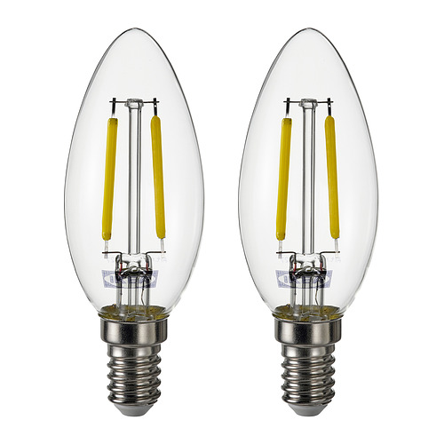 Dos bombillas LED de color blanco cálido con cubiertas de vidrio transparente y bases plateadas, una al lado de la otra.