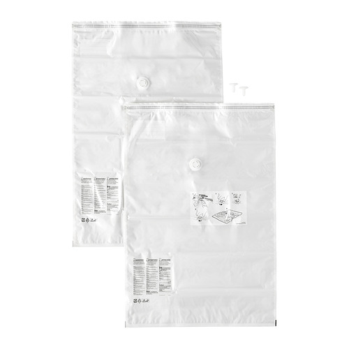 Bolsas de vacío SPANTAD blancas, planas y selladas, listas para su almacenamiento.