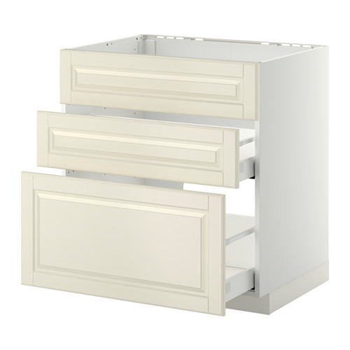Un mueble de cocina METOD con cajones y puertas de color beige roto, con bordes biselados.