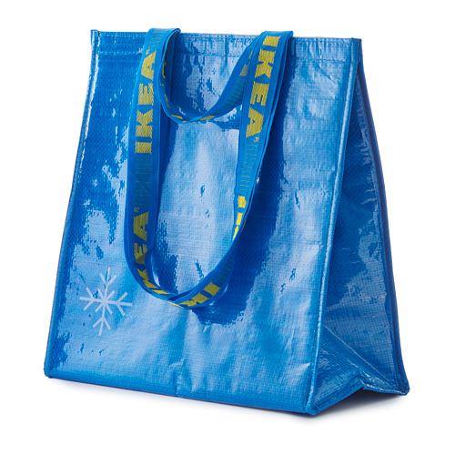 Bolso FRAKTA azul, texturizado, con patrones de asas amarillas, se mantiene en posición vertical con dos asas.