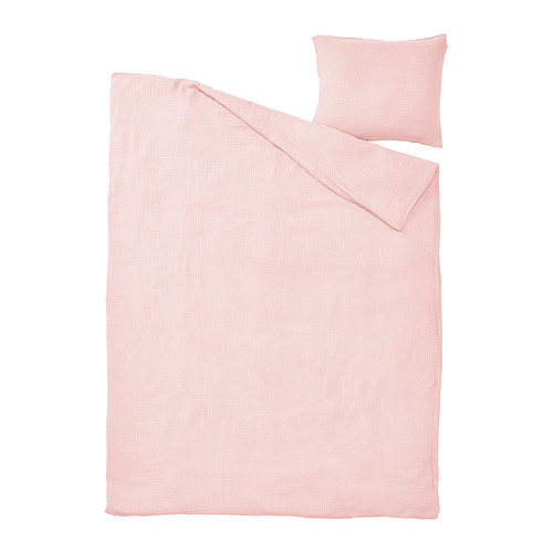 Un juego de cama SCHERSMIN en color rosa claro, con funda nórdica plana y funda de almohada, confeccionada en algodón 100% orgánico, con una textura suave y ondulada.