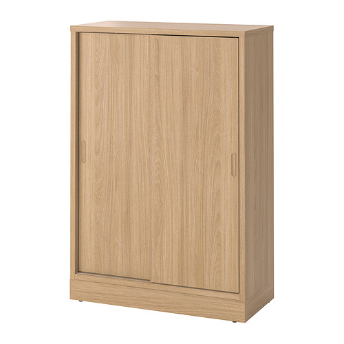 Mueble TONSTAD marrón claro, rectangular con puertas correderas, diseño minimalista, dos estantes ajustables en su interior.