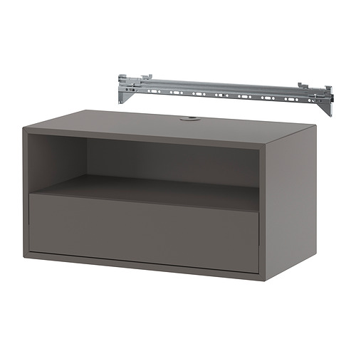 Una estantería de pared EKET gris con un compartimento abierto y un frente de apertura a presión, con soluciones de gestión de cables.