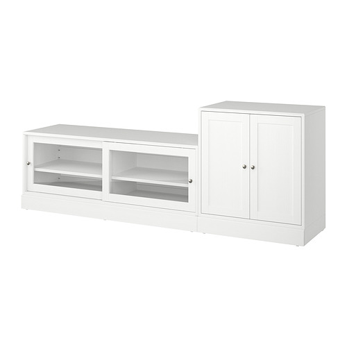Conjunto de muebles HAVSTA blanco, con almacenaje abierto y cerrado con acabado de pino macizo y laca transparente.