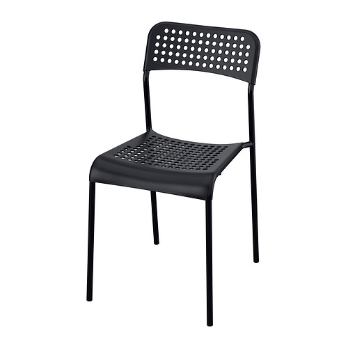Silla Sandberg, negra, asiento y respaldo perforados, apilables, plástico y acero.