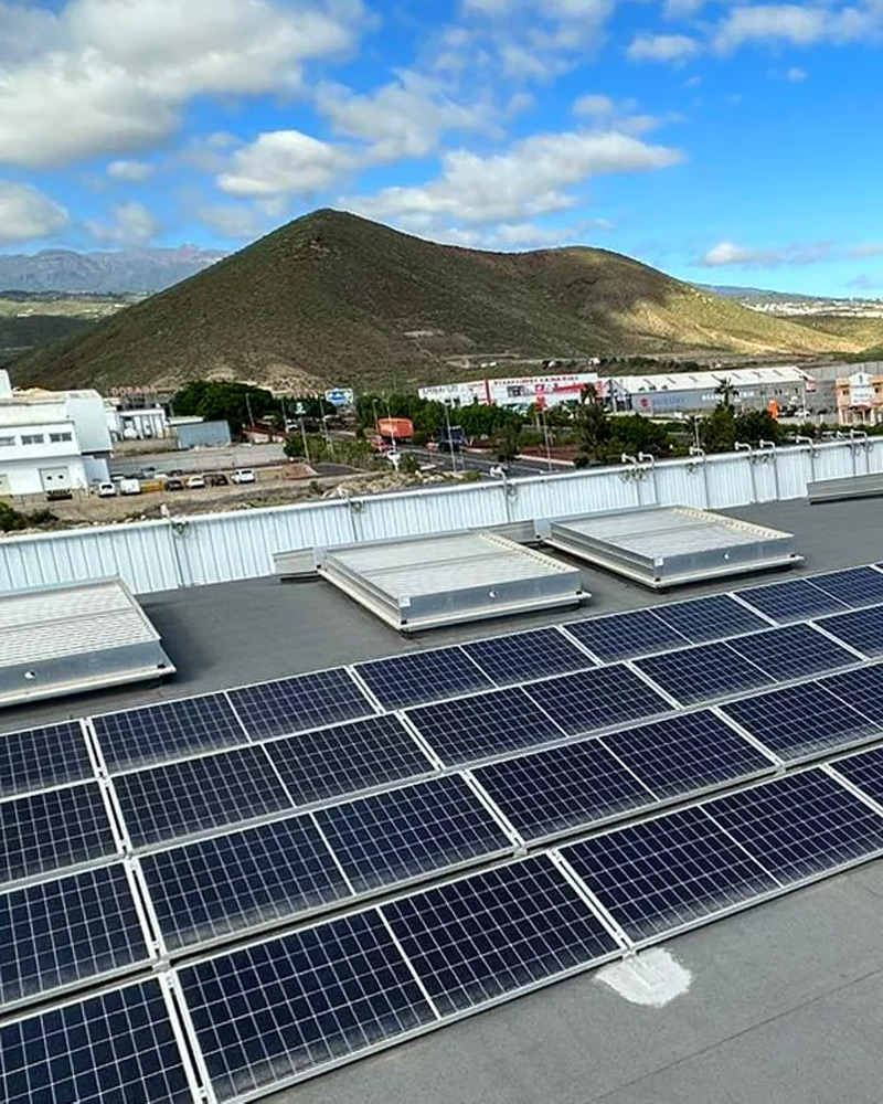Several solar panels on a rooftop