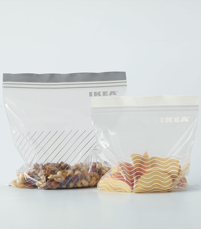 2 fundas plásticas ISTAD rellenas con frutas