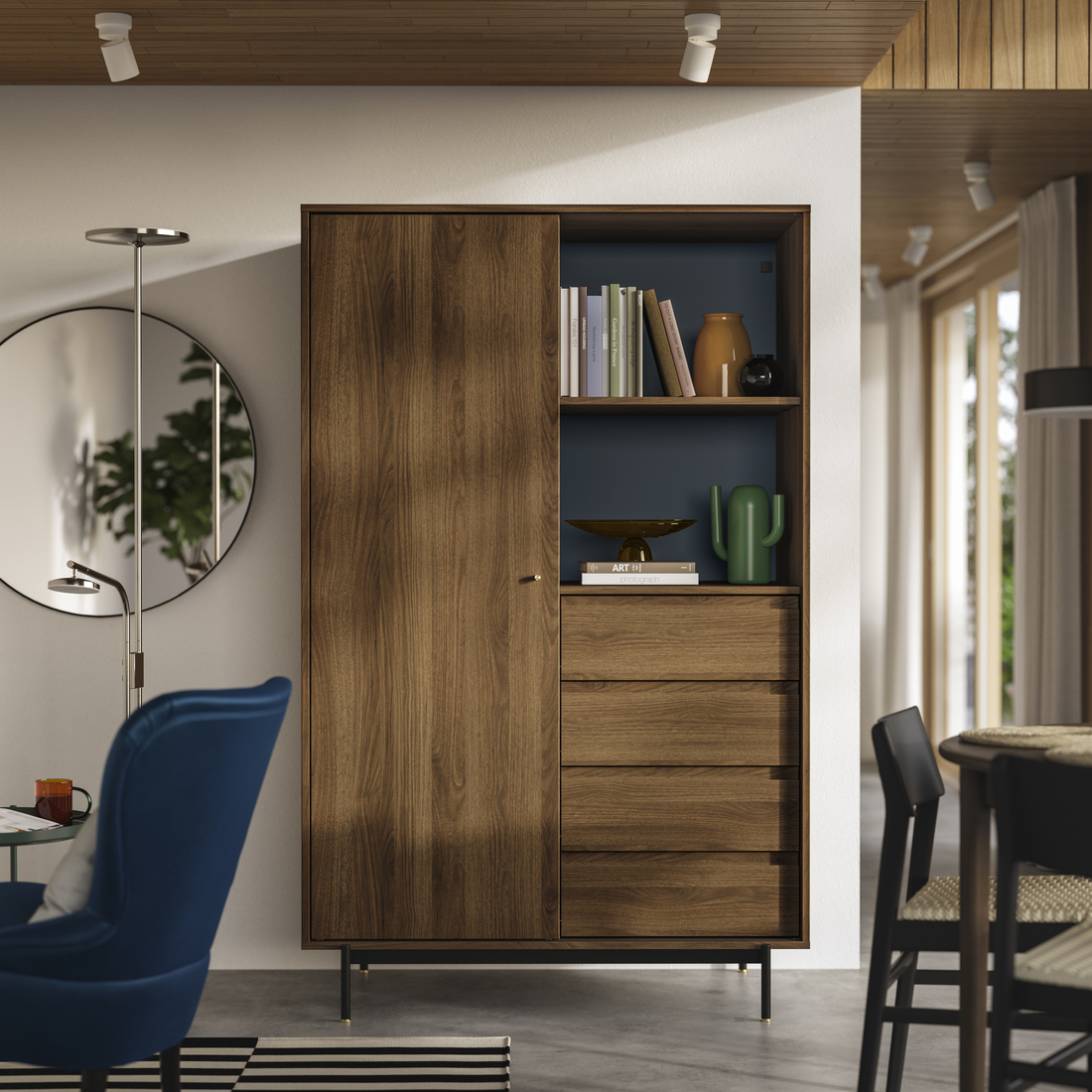 Modern living room space that includes a wood wardrobe and blue chairs, offering an elegant and functional space.