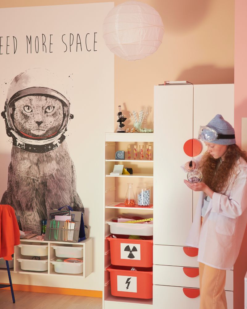 Creative space with SMÅSTAD/PLATSA closet, TROFAST storage, UTRUSTA shelf, BEGRIPA handles and GULLSUDARE lamp shade.