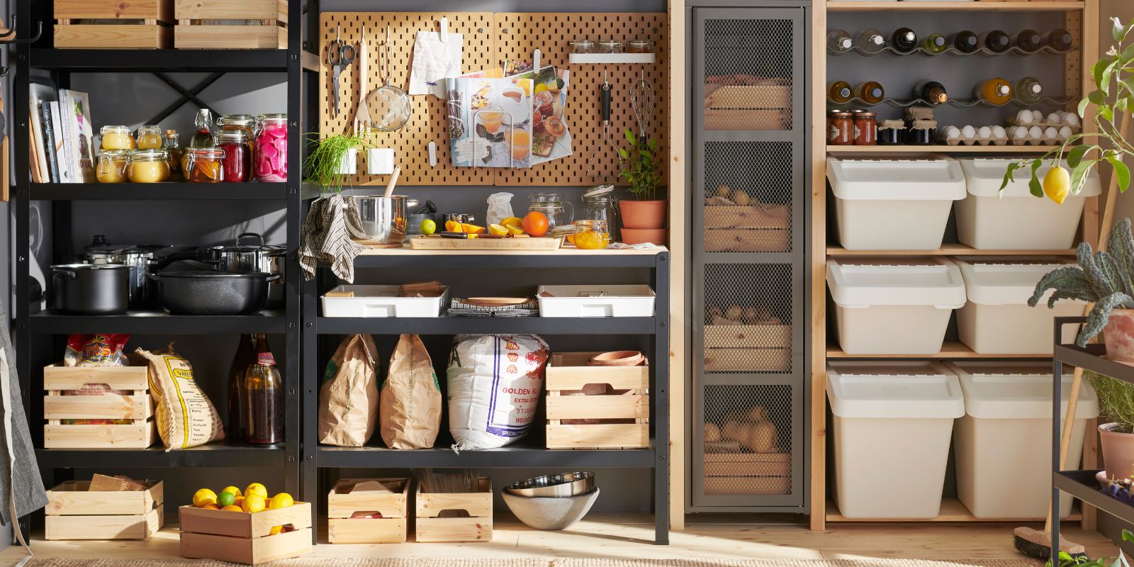 Organized pantry with IVAR and BROR shelves, KNAGGLIG boxes, SORTERA bins and a SKÅDIS board for a warm, functional space.