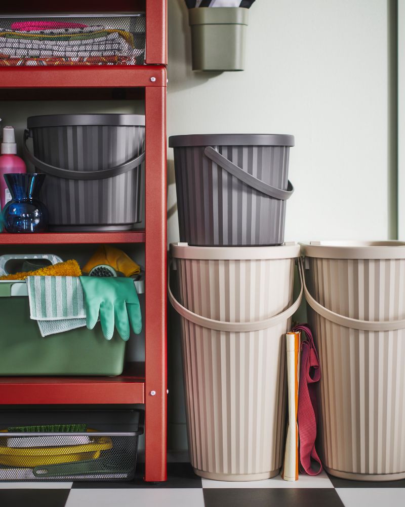 Practical space with DAMMÄNG bins, KOMPLEMENT wire baskets and PEPPRIG cleaning items for tidy organization.