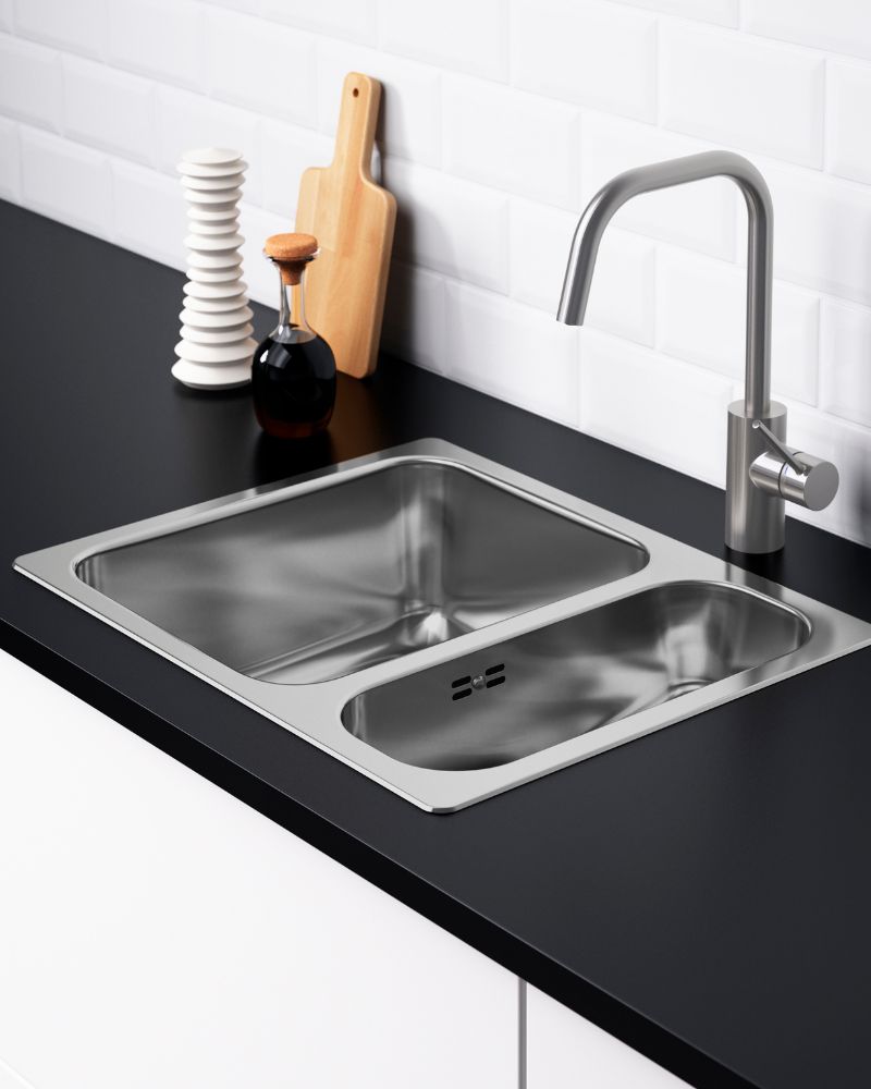 Modern sink area with IKEA ÄLMAREN faucet, EKBACKEN countertop and HILLESJÖN 1.5-bowl inset sink for everyday efficiency.