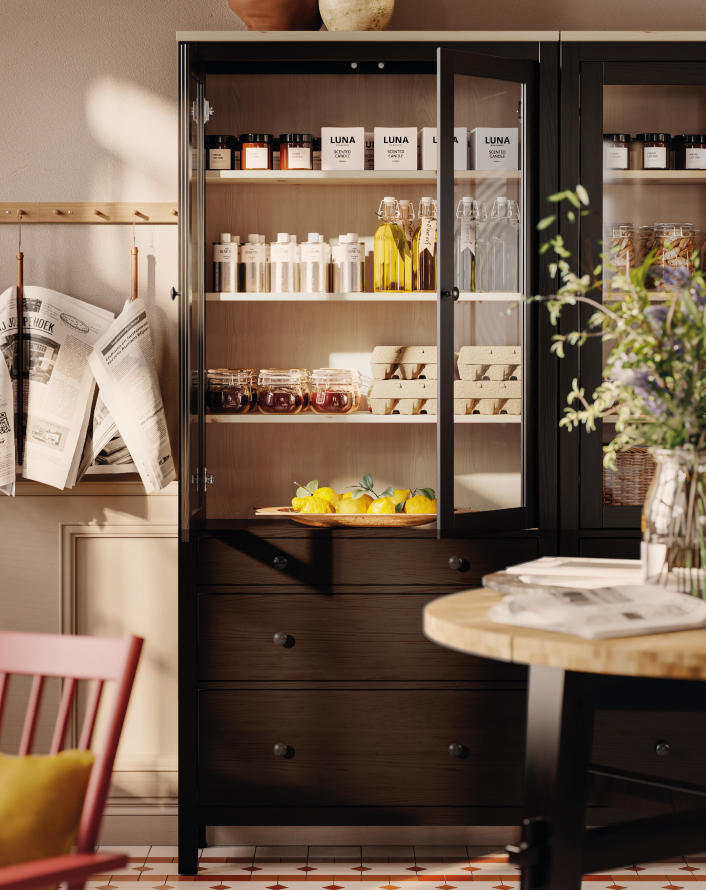 Cabinet with jars, bottles, and neatly arranged food.