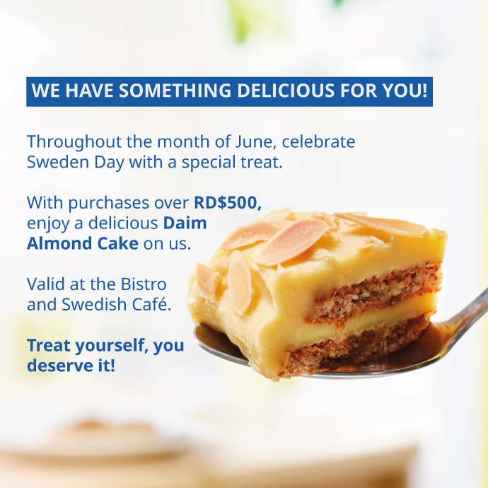 Slice of Daim almond cake on a spoon with June promotion.